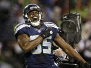 Anthony McCoy reacts after scoring against the San Francisco 49ers during the 2012 season.