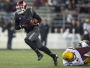 Washington State wide receiver River Cracraft (84) gets past Arizona State linebacker Steffon Martin (2).