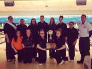 Battle Ground girls bowling team pose with their state championship trophy.