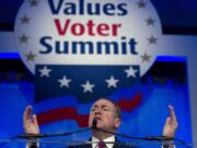 Republican presidential candidate and former Arkansas Gov. Mike Huckabee speaks in September during the Values Voter Summit, held by the Family Research Council Action, in Washington. Some leading Republican presidential candidates seem to view Muslims as fair game for increasingly harsh words they might not dare use against any other group for fear of the political cost. So far, that strategy is winning support from conservatives influential in picking the nominee.