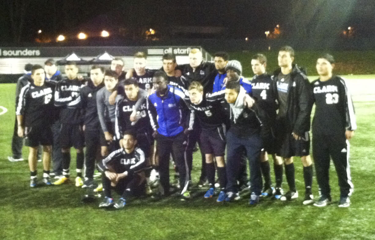 The Clark College soccer team poses for a team photo following Sunday's 1-0 loss to Peninsula in the NWAACC championship match at Starfire Complex in Tukwila.