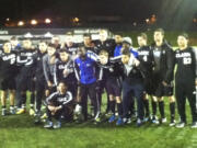 The Clark College soccer team poses for a team photo following Sunday's 1-0 loss to Peninsula in the NWAACC championship match at Starfire Complex in Tukwila.