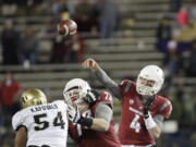 Washington State quarterback Luke Falk (4) throws a pass during the second half of an NCAA college football game against Colorado, Saturday, Nov. 21, 2015, in Pullman, Wash. Washington State won 27-3.