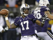 Washington quarterback Keith Price is uncertain whether he'll play Saturday against Oregon State. (AP Photo/Ted S.