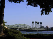 The Interstate 5 bridge spans the Columbia River between Oregon and Washington.