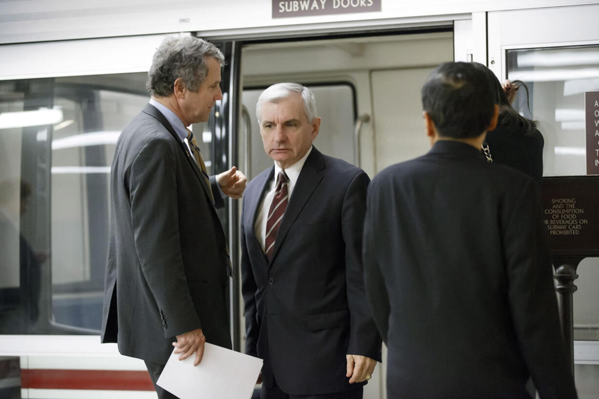 Sen. Jack Reed, D-R.I., right, and Sen.