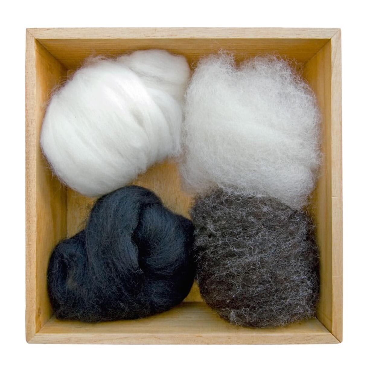 A box of washed and combed wool can be used for needle felting, as seen in the book &quot;Wool Pets&quot; by Laurie Sharp. Needle felting is an easy craft to learn. &quot;It can pretty quickly resemble something,&quot; says Sharp of Suquamish. &quot;A blob with wings becomes an owl.