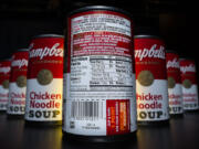 The nutrition information is shown on the back of a Campbell's Chicken Noodle soup can.