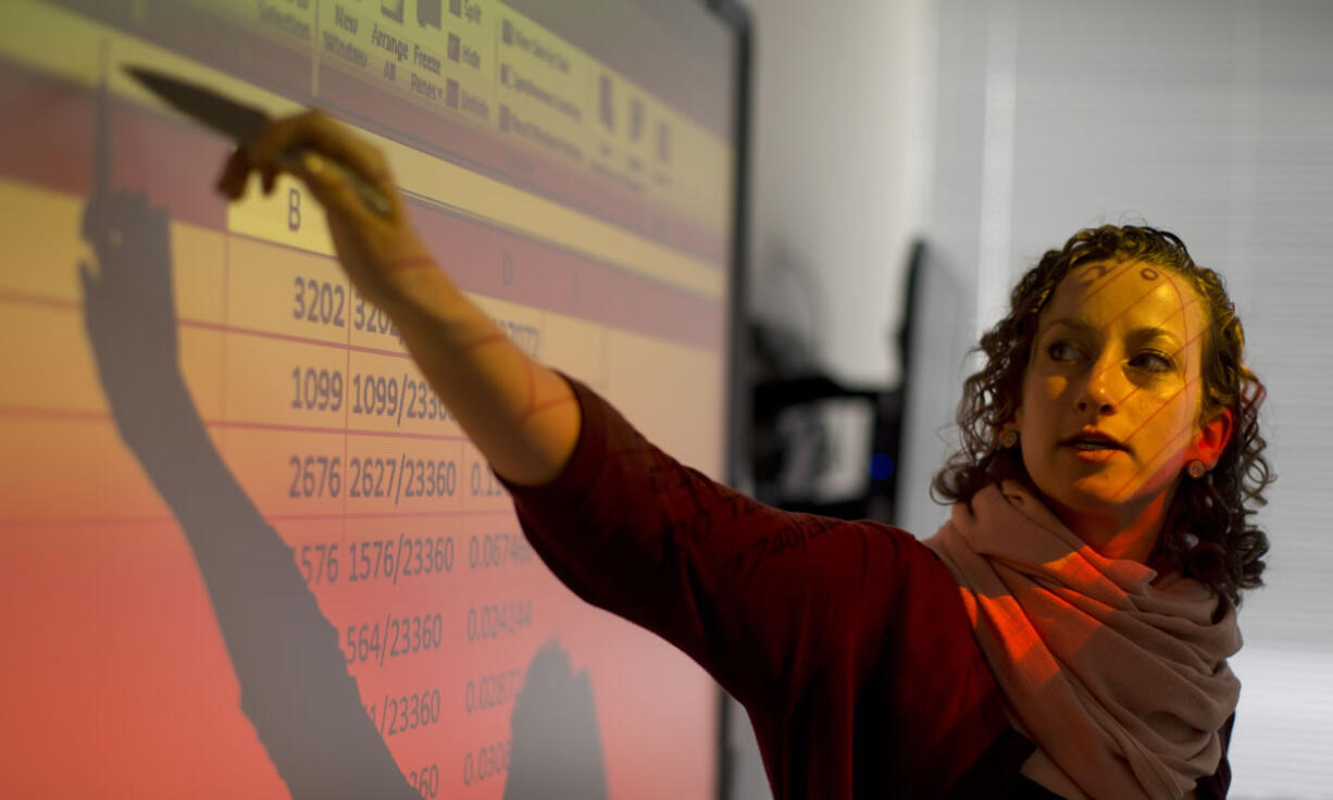 Rosemary Downing teaches a General Educational Development test preparation class last month at the Carlos Rosario International Public Charter School in Washington, D.C.