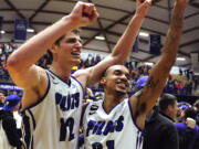 Thomas van der Mars (12) and Korey Thieleke (21) celebrate Portland's win over Gonzaga on Thursday.