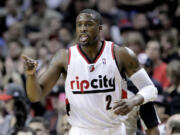 Portland Trail Blazers guard Wesley Matthews points to a teammate for an assist after scoring a 3-point shot during the first half against the Atlanta Hawks on Wednesday.