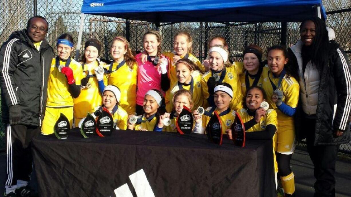 FC Salmon Creek Nemesis girls soccer team after winning the Northwest Champions League under-13 division championship on Sunday.