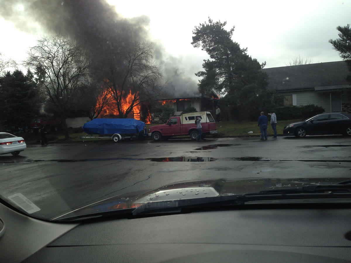 A passer-by, who didn't want his name published, sent this photo of a burning house to The Columbian. One woman died as the house burned Friday, Jan.