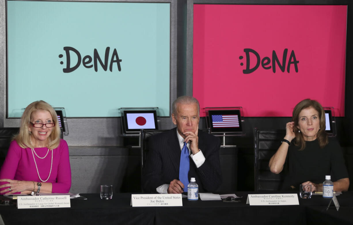 U.S. Vice President Joe Biden, center, and U.S. Ambassador to Japan Caroline Kennedy, right, listen as Catherine Russell, U.S.