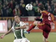 Portland Timbers defender Jack Jewsbury, left, is questionable for Saturday's match against Vancouver after sustaining a concussion last weekend against Sporting Kansas City.