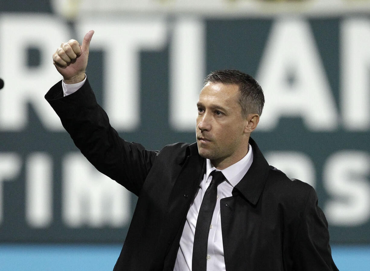 Timbers coach Caleb Porter acknowledges Portland fans before the team's final home game in the Major League Soccer Western Conference finals.