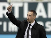 Timbers coach Caleb Porter acknowledges Portland fans before the team's final home game in the Major League Soccer Western Conference finals.