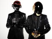 Thomas Bangalter, left, and Guy-Manuel de Homem-Christo, from the music group Daft Punk, won Grammy Awards for album of the year for &quot;Random Access Memories&quot; and record of the year for &quot;Get Lucky.&quot;