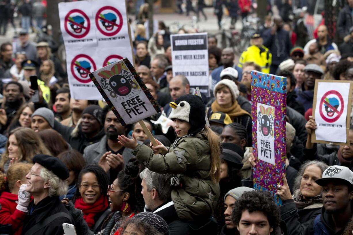 Demonstrators gather to protest against &quot;Zwarte Piet&quot; or Black Pete, on Saturday in Amsterdam.