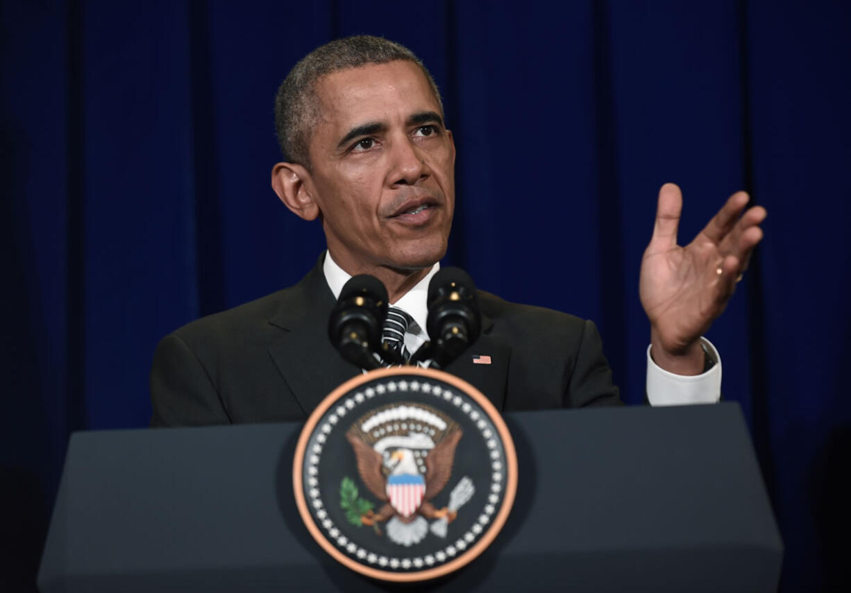 President Barack Obama speaks at a news conference Sunday in Kuala Lumpur, Malaysia. Obama vowed Sunday that the United States and its international partners &quot;will not relent&quot; in the fight against the Islamic State.