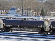 Tesoro Corp. said Thursday that it would acquire new, safer rail cars to transport oil from the Bakken shale formation in North Dakota to the Port of Vancouver, where the oil will be transferred to ships for transport to U.S. oil refineries. Recent accidents have raised concerns about tanker car safety.