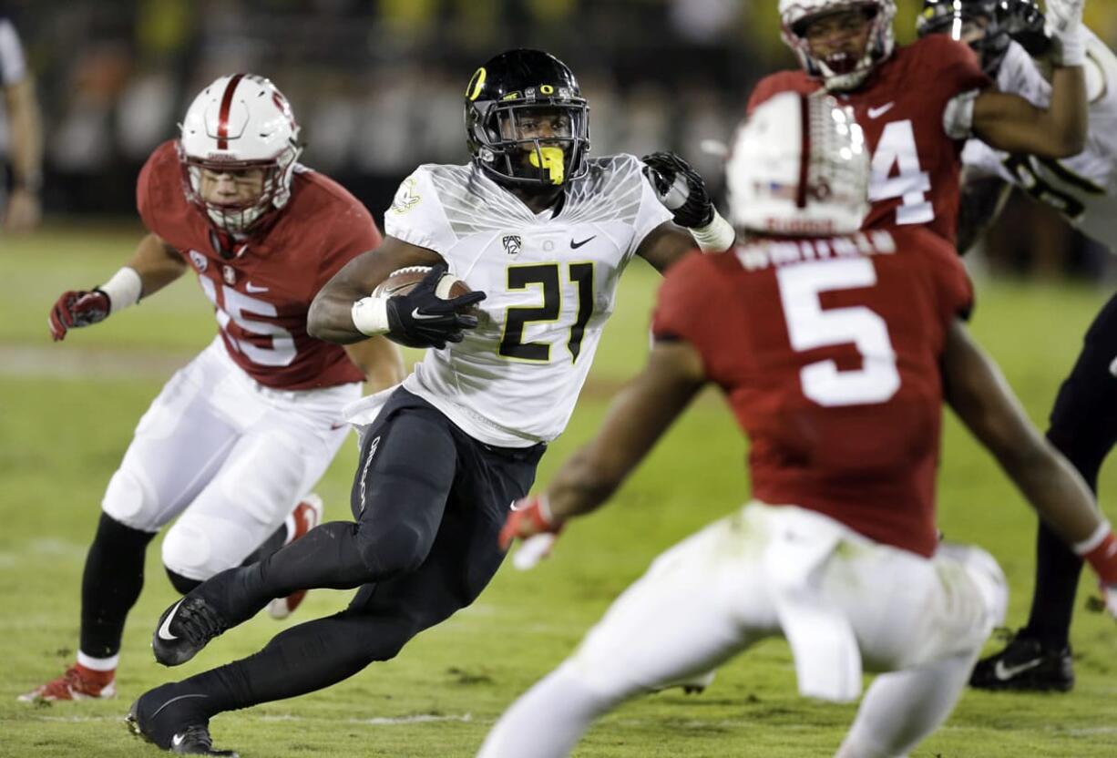 Oregon's Royce Freeman (21) runs for a touchdown against Stanford during the second half of an NCAA college football game Saturday, Nov. 14, 2015, in Stanford, Calif.