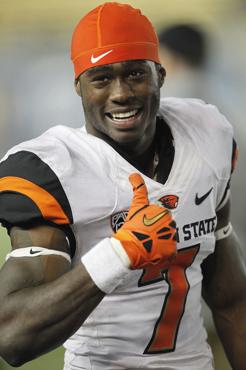 Oregon State wide receiver Brandin Cooks (7) gives a thumbs up to Oregon State fans from the sidelines during the final seconds against California on Saturday.