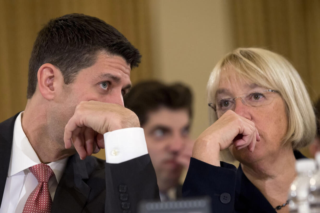 House Budget Committee Chairman Rep. Paul Ryan, R-Wis., left, speaks with Senate Budget Committee Chair Sen. Patty Murray, D-Wash., on Capitol Hill in Washington on Nov. 13 at the start of a Congressional Budget Conference.