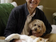 Meg McNabb, with her dogs, Ruby, front, and Missy, has been doing pet home euthanasia&#039;s for two years in Portland.