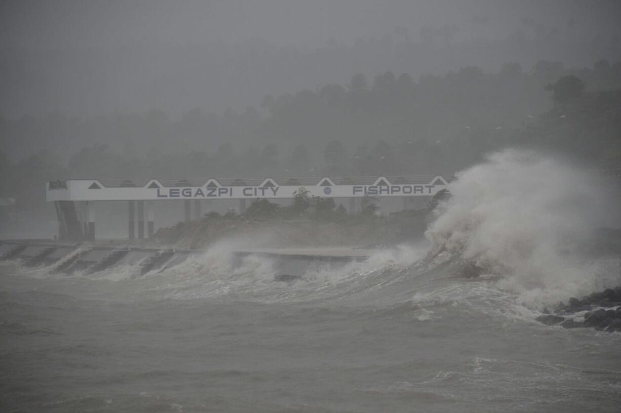 Huge waves brought about by powerful typhoon Haiyan hit the shoreline in Legazpi city, Albay province Friday, about 325 miles south of Manila, Philippines.