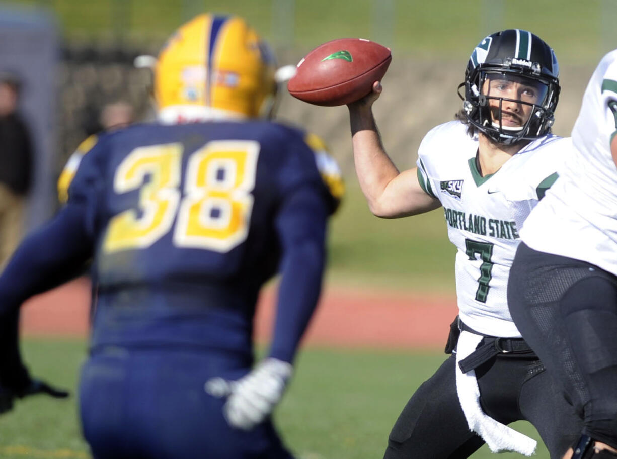 Portland State's Alex Kuresa, right, looks for an open teammate as Northern Colorado's Taylor Risner closes in during an NCAA college football game, Saturday, Nov.