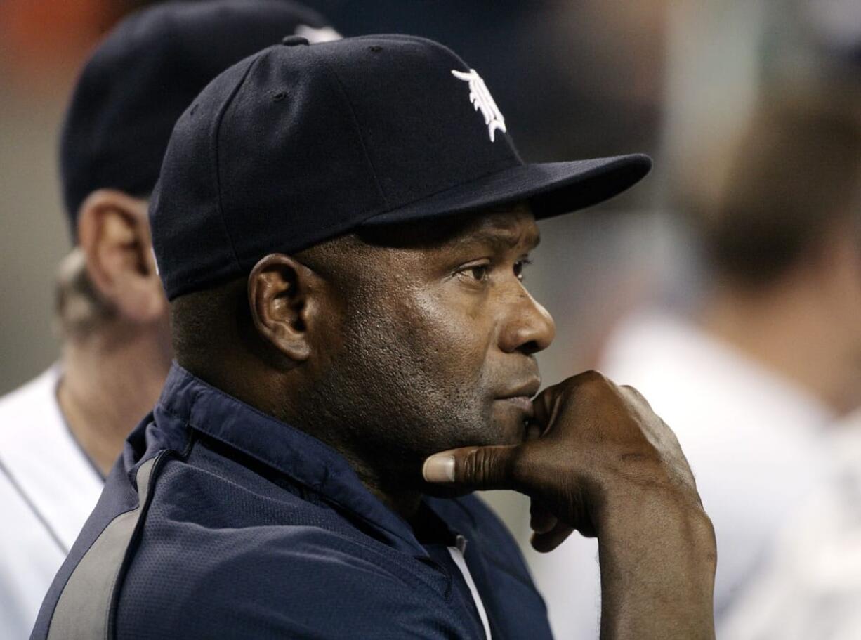 In this May 29, 2011, photo, Detroit Tigers hitting coach Lloyd McClendon watches from the dugout during the Tigers' baseball game against the Boston Red Sox in a doubleheader in Detroit. The Seattle Mariners have hired McClendon to be their next manager. The Mariners announced their decision on Tuesday, Nov. 5, 2013. McClendon becomes the third manager hired by general manager Jack Zduriencik. McClendon will be formally introduced by the team later this week.