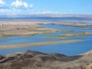 The Columbia River flows through the Hanford Reach National Monument in 2007. Scientists estimate 200,000 chinook are spawning in the Hanford Reach, the most fish ever counted in this area since dams were constructed in the 1930s.