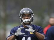 Seattle receiver Percy Harvin (11) was back at practice Thursday.