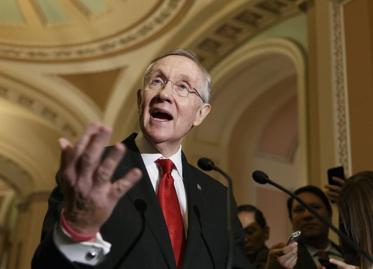 Senate Majority Leader Harry Reid of Nev., faces reporters on Capitol Hill in Washington on Tuesday.