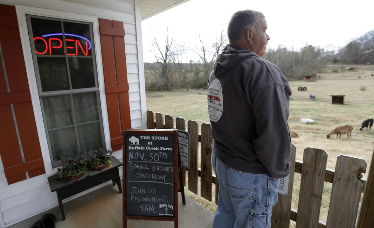 Owner Johnny Blakley looks out over Buffalo Creek Farm and Creamery Farmstead Goat Dairy in Germanton, N.C.