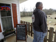 Owner Johnny Blakley looks out over Buffalo Creek Farm and Creamery Farmstead Goat Dairy in Germanton, N.C.