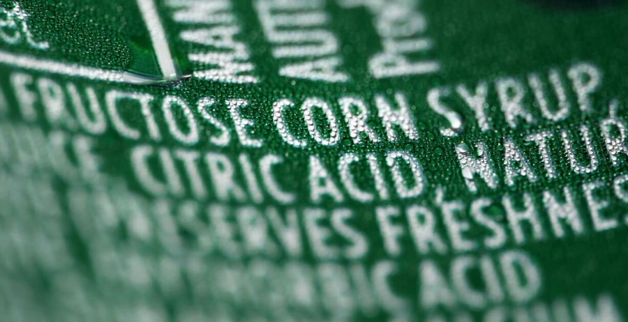 A nutrition label that lists high fructose corn syrup as an ingredient in a can of soda.