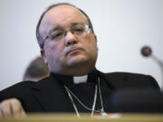 Former Vatican Chief Prosecutor of Clerical Sexual Abuse Charles Scicluna waits for the start of a questioning over clerical sexual abuse of children at the headquarters of the office of the High Commissioner for Human Rights, OHCHR, in Geneva, Switzerland, on Thursday.