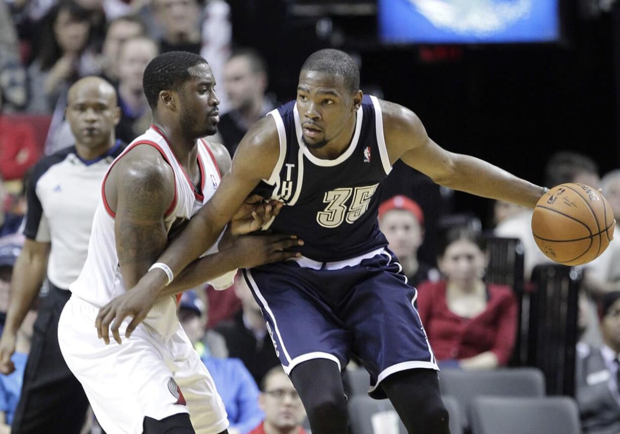 Oklahoma City's Kevin Durant is defended by Portland's Wesley Matthews on Tuesday.