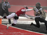 Towson Tigers wide receiver Brian Dowling (29) makes a touchdown reception as Eastern Washington  defensive back Miles Weatheroy, left, comes up short during the first half of the FCS  semifinals at Roos Field, Saturday.