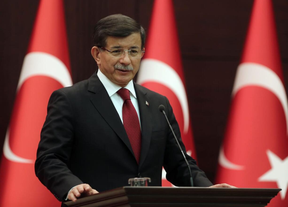 Turkish Prime Minister Ahmet Davutoglu announces his new Cabinet in Ankara, Turkey, on Tuesday. President Recep Tayyip Erdogan has approved a new government led by Davutoglu following the ruling party&#039;s victory in Turkey?s Nov 1 election.