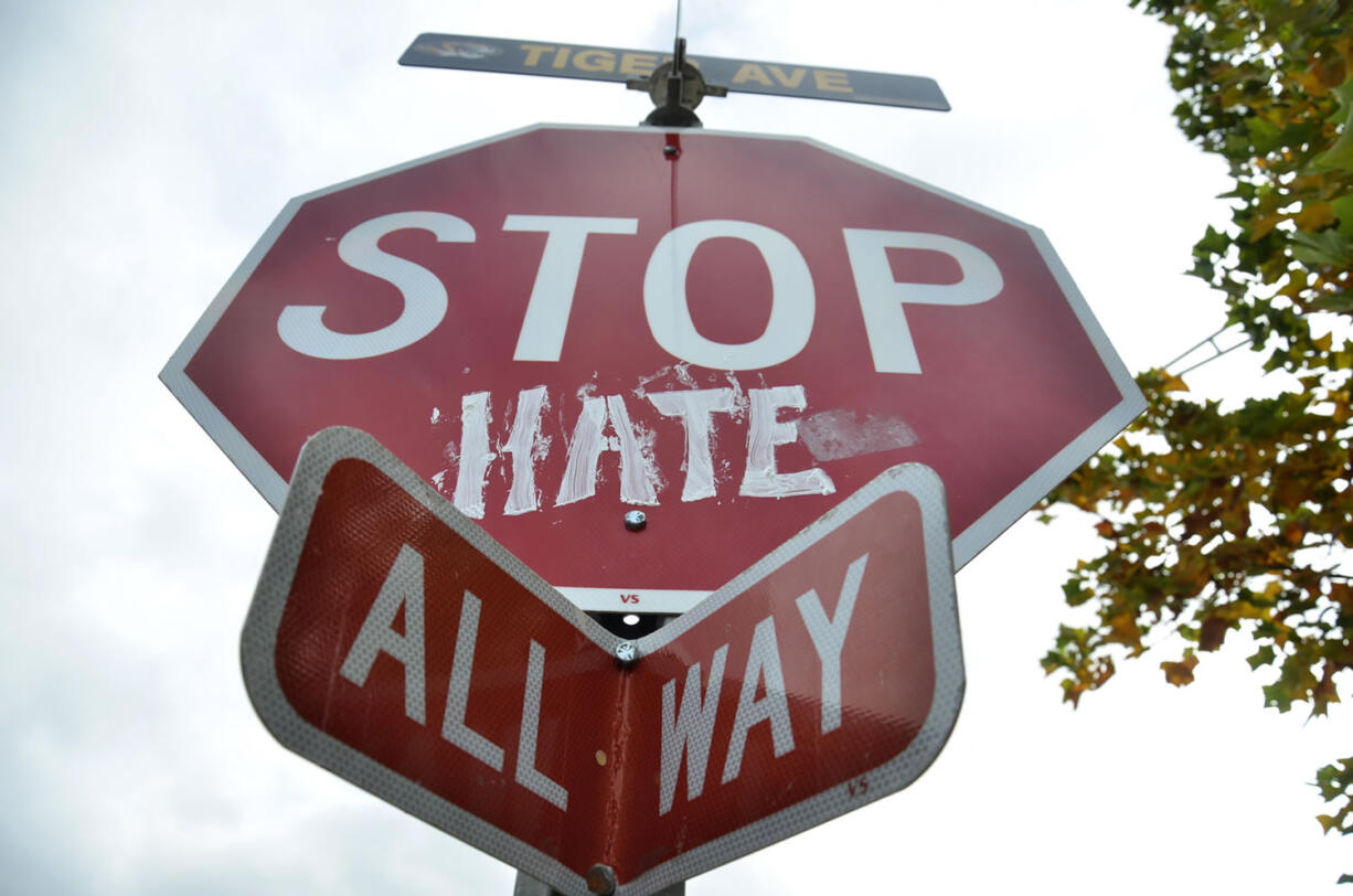 A stop sign on the corner of Tiger Avenue and Conley Avenue on the University of Missouri campus has been altered to say &quot;Stop Hate&quot; on Wednesday in Columbia, Mo. Several classes were canceled on Wednesday after various threats were made to campus Tuesday night.