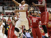 Stanford 's Anthony Brown (21) scores against Washington State during the second half Wednesday at Stanford, Calif. The Cardinal won 80-48.