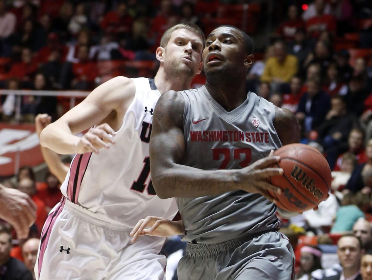 Washington State forward D.J. Shelton (23) drives against Utah forward Renan Lenz (10) during the first half in Salt Lake City on Saturday.