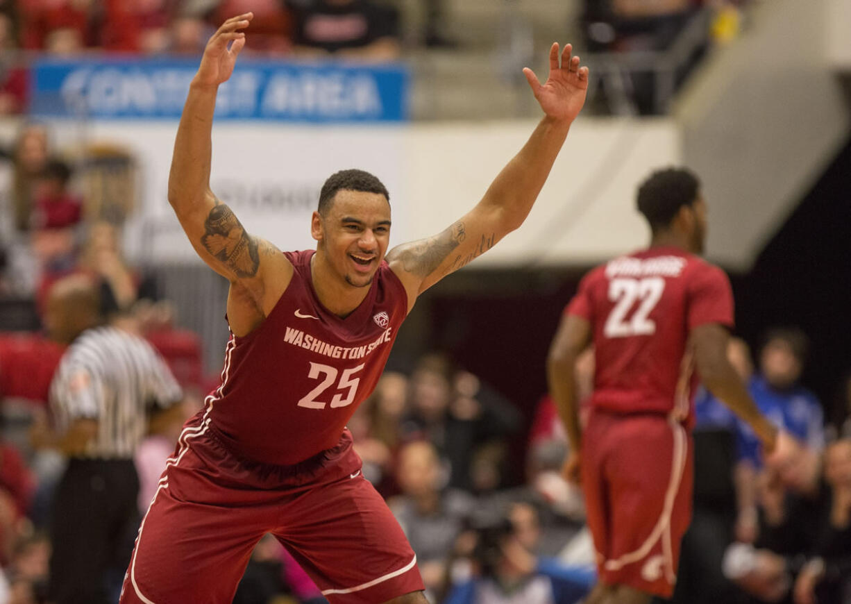 Washington State guard DaVonte Lacy (25) reacts during the second half of an NCAA college basketball game against Washington on Saturday, Feb. 1, 2014, in Pullman, Wash. Washington State won 72-67.