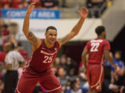 Washington State guard DaVonte Lacy (25) reacts during the second half of an NCAA college basketball game against Washington on Saturday, Feb. 1, 2014, in Pullman, Wash. Washington State won 72-67.