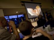 Columbia Springs and Clark County Environmental Services sponsor a bat and owl workshop for kids and parents in 2011 at the Water Resources Education Center.