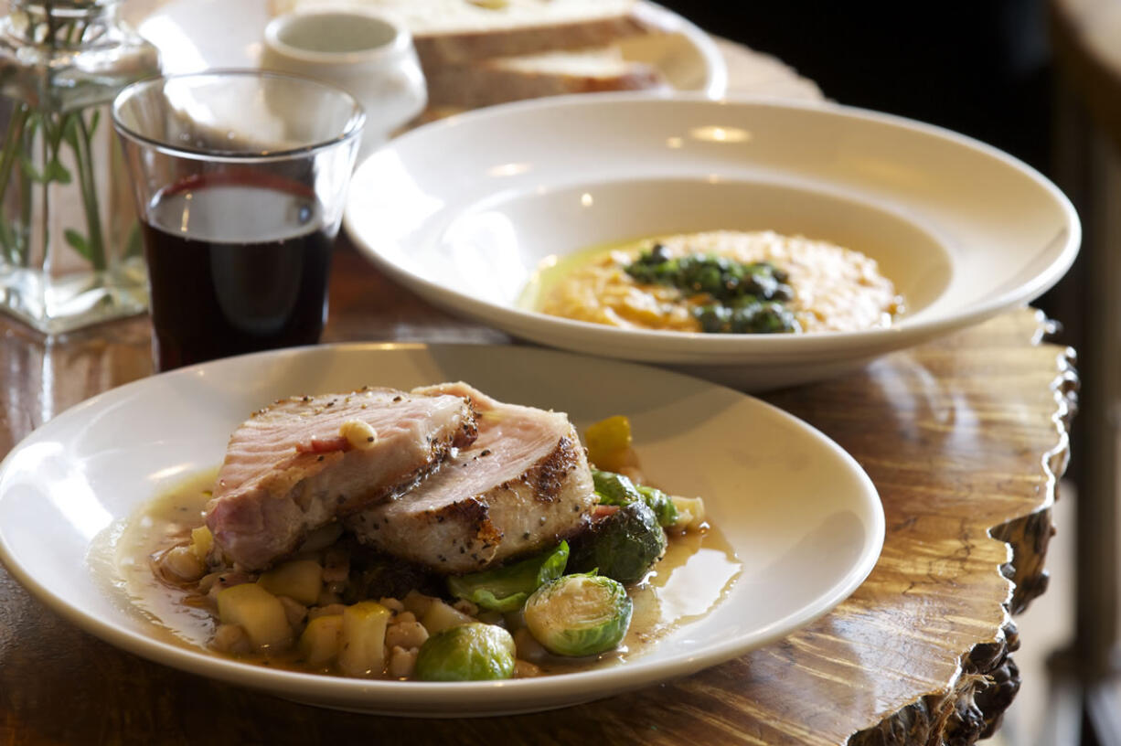 Willem's on Main in Vancouver serves a grilled pork loin and soft polenta salsa verde.