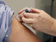 The flu is continuing to circulate through Clark County, spreading faster and earlier than previous years.